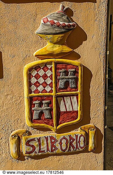 Coat of arms and lettering of San Liborio on house wall  Marciana Alta  Elba  Tuscany  Italy  Europe