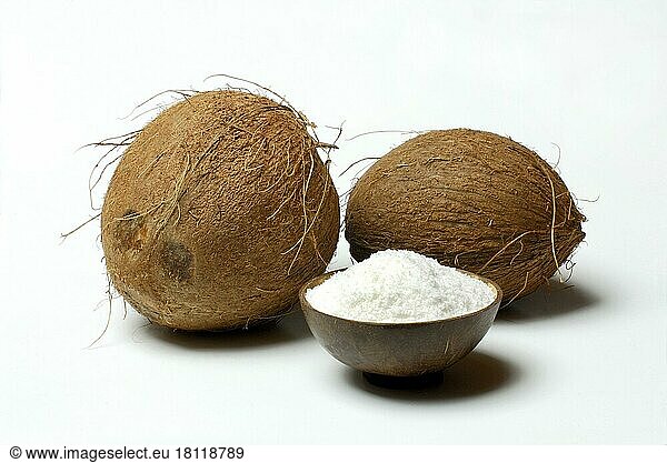 Coconuts and shell with coconut flakes (Cocos nucifera)   coconut  coconut flakes