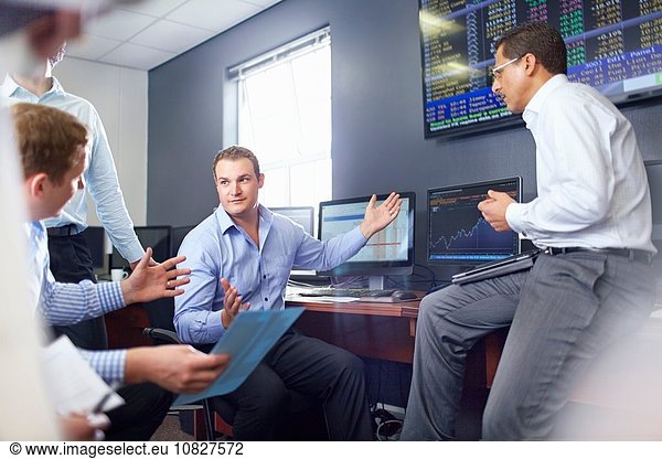Colleagues in office having discussion hand gestures