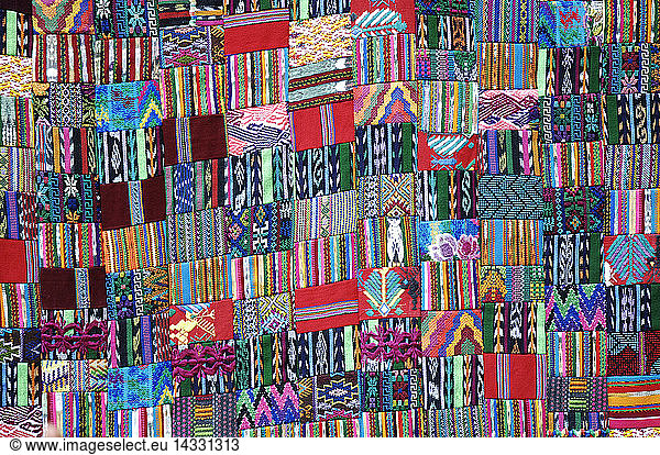 Colorful fabrics at the Sunday market  Chichicastenango. El Quiche. Guatemala; Central America