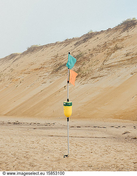 Colorful flags wave in the coastal breeze