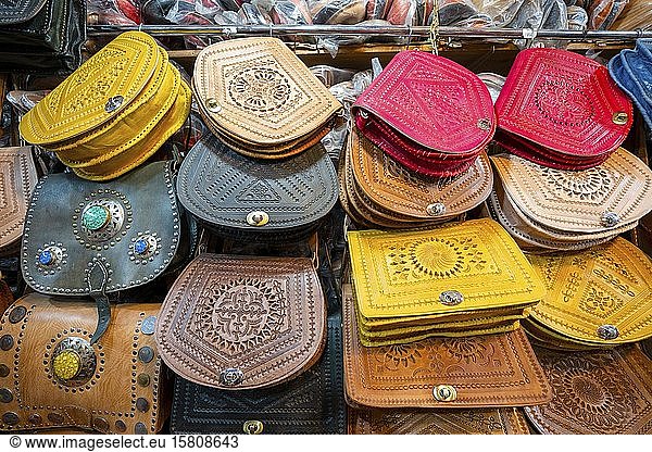 Colorful handmade leather bags at the market of Marrakech  Morocco  Africa