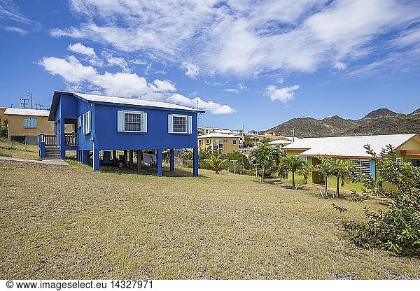 Colorful houses of a village on a spring sunny day  Montserrat  Caribbean  Leeward Islands  Lesser  Antilles