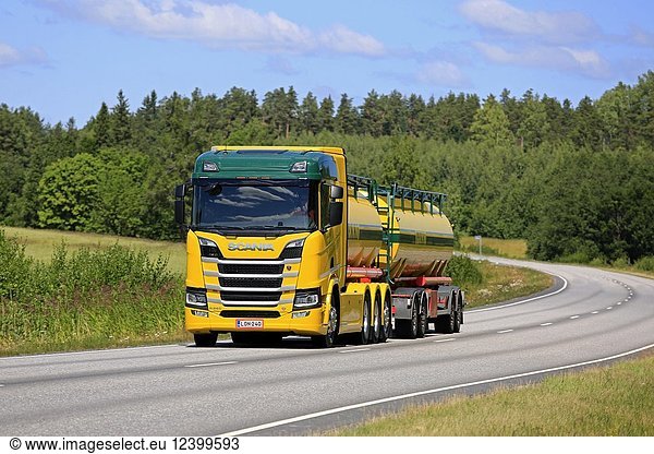 Colorful Next Generation Scania R580 V8 tank truck of K Pekki Oy hauls load along highway on a beautiful day of summer. Salo  Finland - July 1  2018.