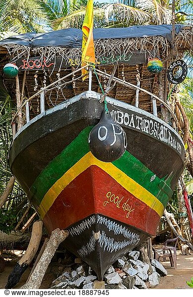 Colorful restaurant ship in the garden of of a tourist resort in Tangalle  Sri Lanka. According the rumors  the ship was coming with the tsunami in 2004