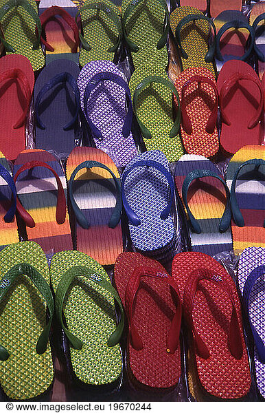 Colorful slippers displayed for sale  Tanzania  Africa.