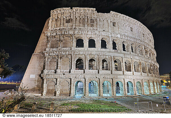 Colosseum lit up at night  Rome  Italy
