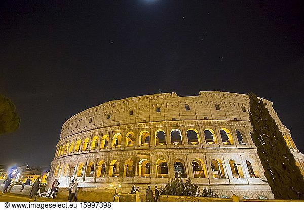 Colosseum  Rome  Italy. Night view of Colosseo in Rome  elliptical largest amphitheatre of Roman Empire ancient civilization.