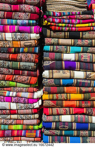 Colourful fabrics on market stall  San Pedro de Atacama