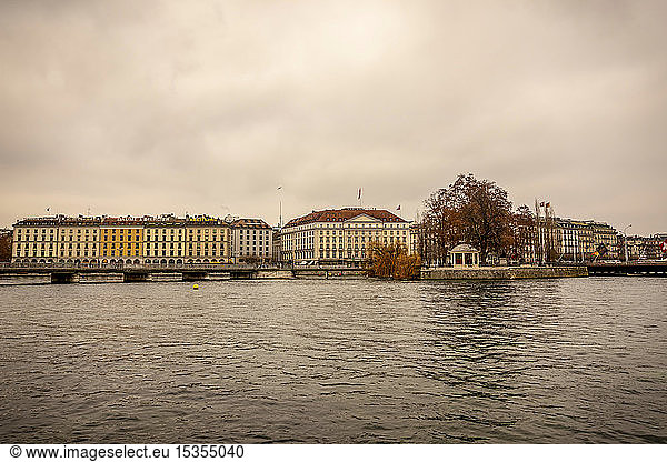 Colourful residential buildings along the water of Lake Geneva; Geneva  Geneva  Switzerland