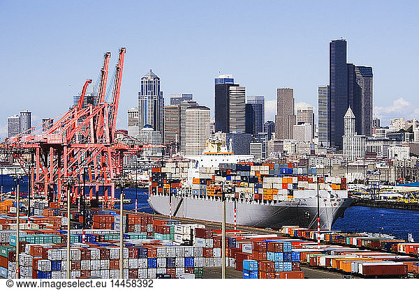 Commercial dock with city in background  Seattle  Washington  United States