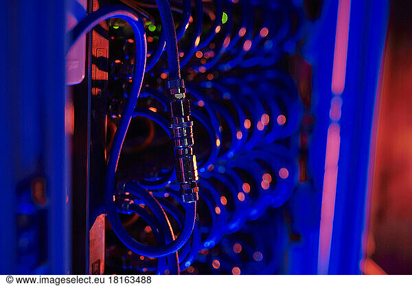 Computer cables attached together in server room