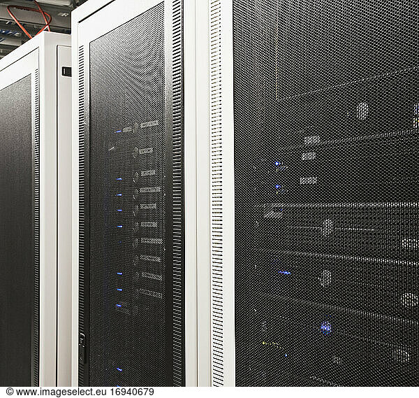 Computer servers in cabinets.