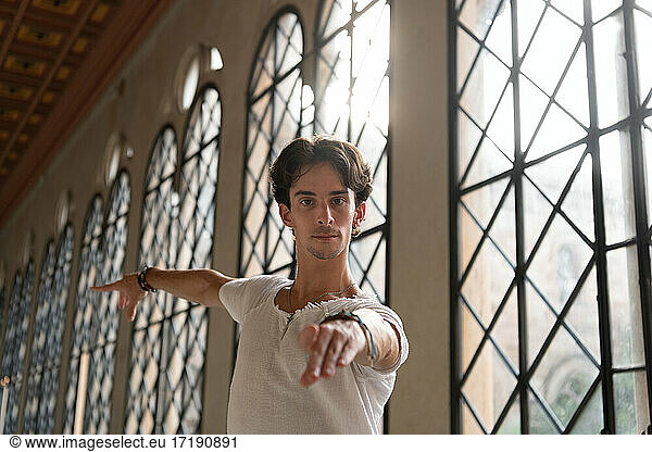 Concentrated man rehearsing Latin dance