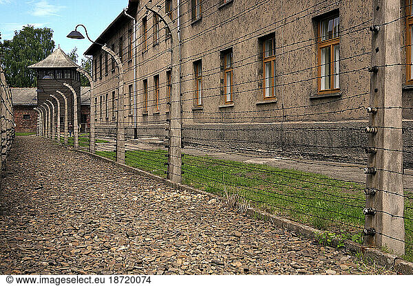 Concentration camp buildings and fence in Auschwitz