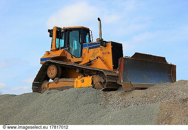 Construction machine  bulldozer  also crawler  bulldozer or flat excavator  tracked vehicle