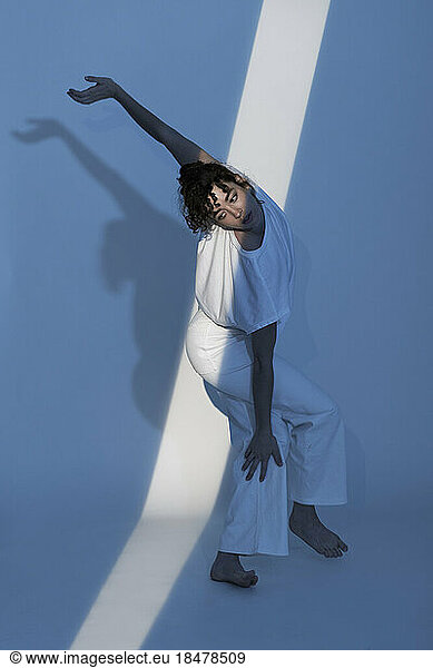 Contemporary dancer dancing over white background
