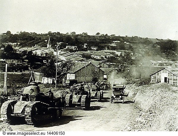 Convoy of tanks leaving Rampont in the French countryside. 337th Co 13 Bat 505th Reg - French tanks passing through Rampont.