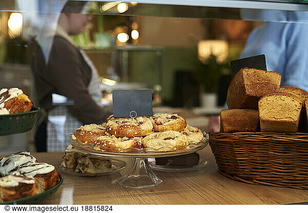 Cookies and sweet buns in retail display