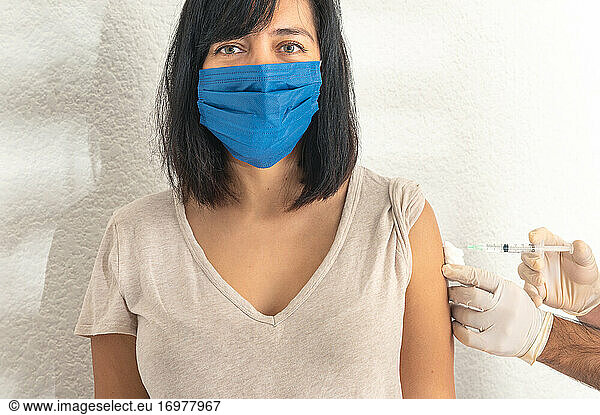 Coronavirus vaccine  woman get vaccine during coronavirus pandemic.