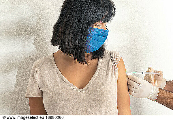 Coronavirus vaccine  woman get vaccine during coronavirus pandemic.