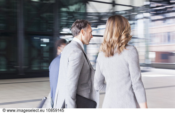 Corporate business people walking