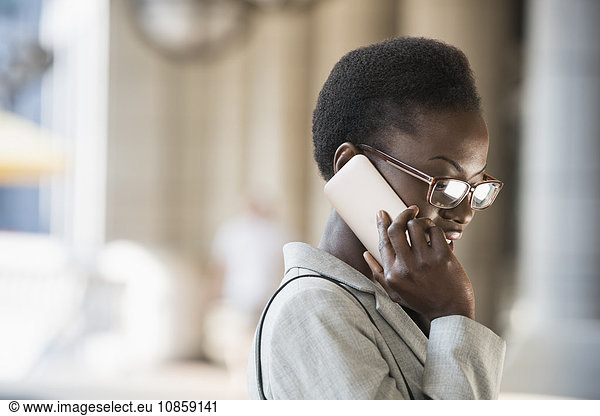Corporate businesswoman talking on cell phone