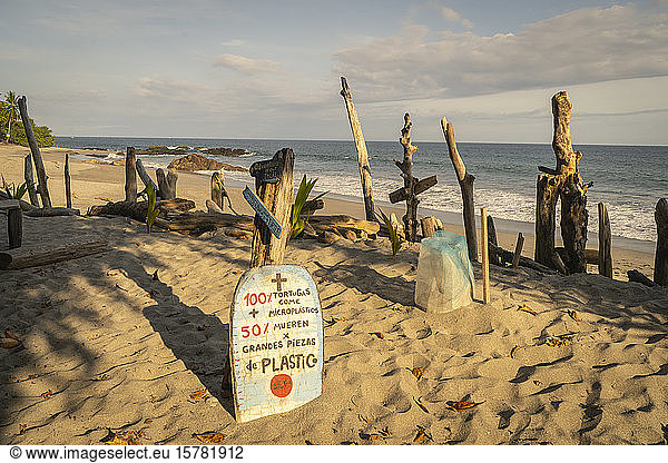 Costa Rica  Puntarenas Province  Montezuma  Sign on sandy coastal beach