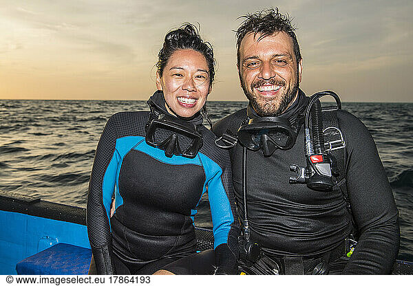 couple after a dive on a boat at Tubbataha reef