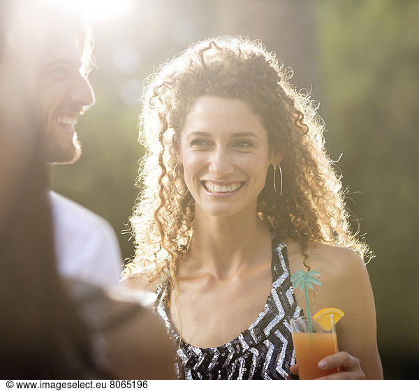 Couple having drinks outdoors