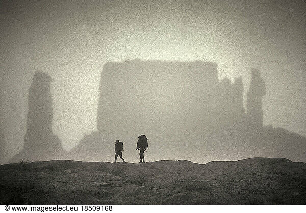 Couple Hiking in desert  Utah.