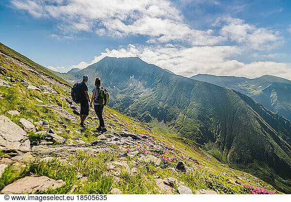 Couple Hiking in the Carpathian Mountains - Moldoveanu Peak