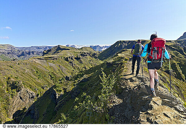 couple hiking in the Thorsmork valley in Iceland