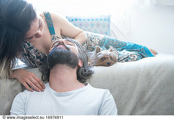 Couple in love laughing in their room. Valentine's day