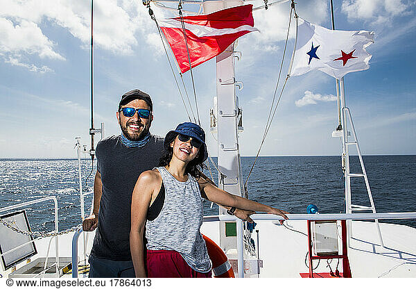 couple on board of a research vessel at Tubbataha reef