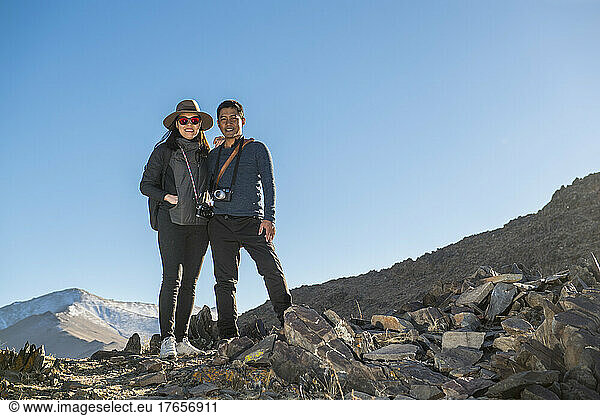 couple posing for camera at remote location in Mongolia