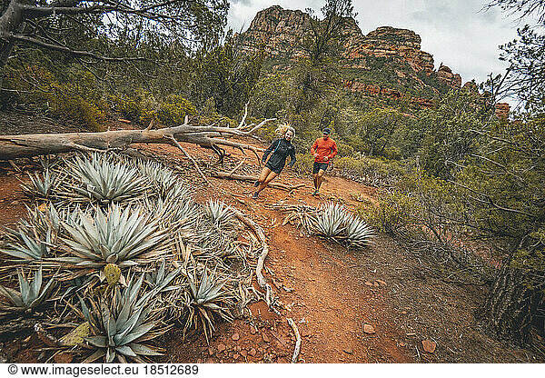 Couple Running Trails Near Devil's Bridge