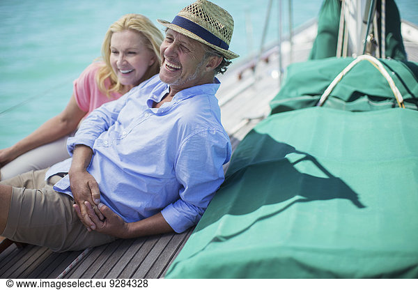 Couple sitting on boat together