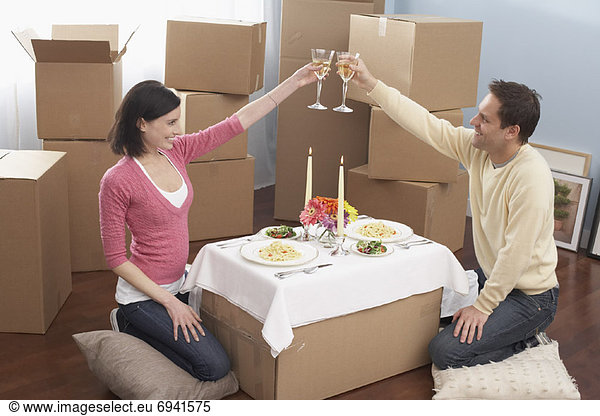 Couple Toasting in New Home