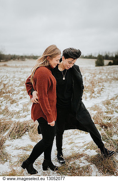 Couple walking in snowy landscape  Georgetown  Canada