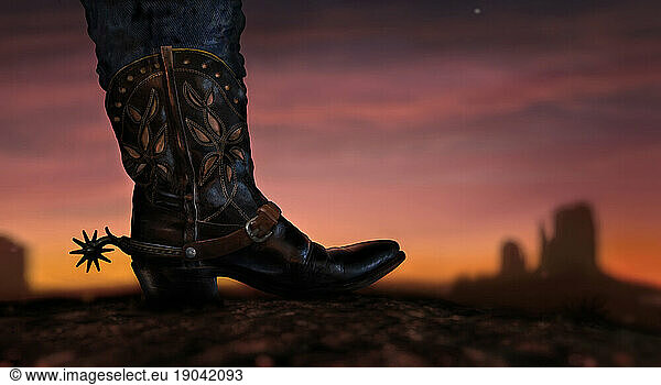 Cowboy boot and Mittens at sunset  Monument Valley  Arizona  USA