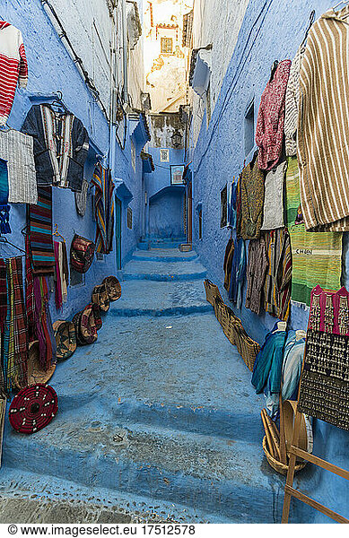 Craft products arranged on wall and steps for sale in old town  Chefchaouen  Morocco