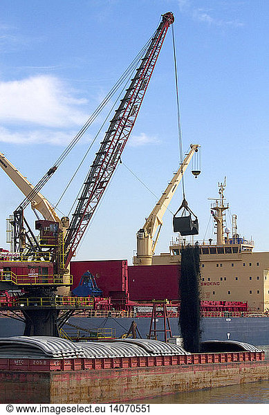 Crane Loading a Barge