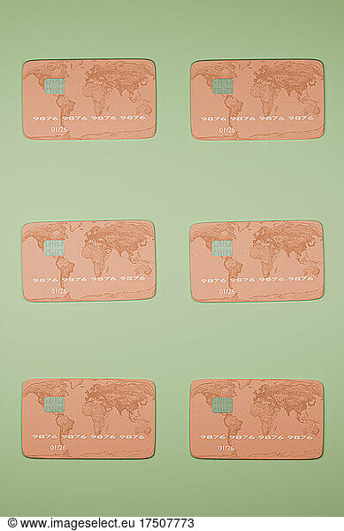 Credit cards arranged on green background