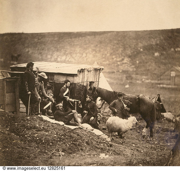 CRIMEAN WAR: DRAGOON GUARDS. Group of 4th Dragoon Guards of the British Army at camp during the Crimean War. Photograph by Roger Fenton,  1855.