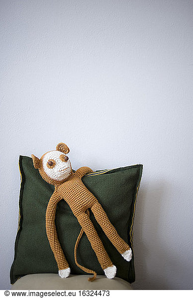 Crocheted toy monkey