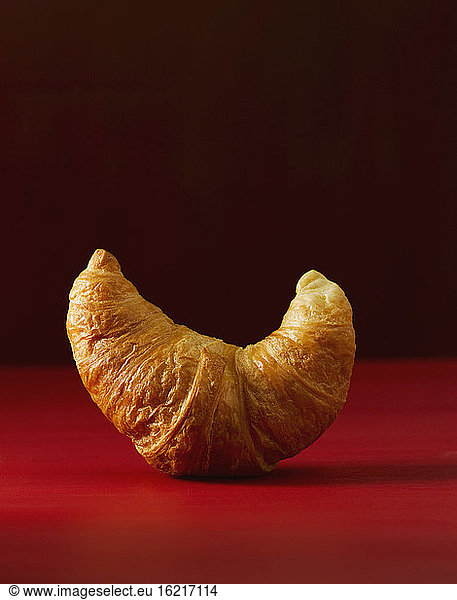 Croissant on red