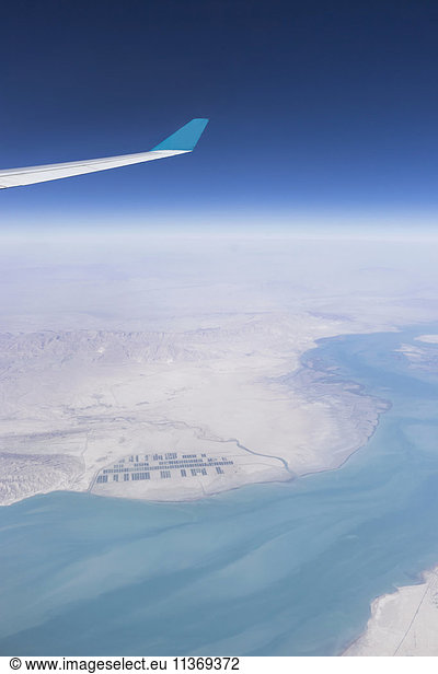 Cropped image of airplane flying above oman and red sea Iran  Oman