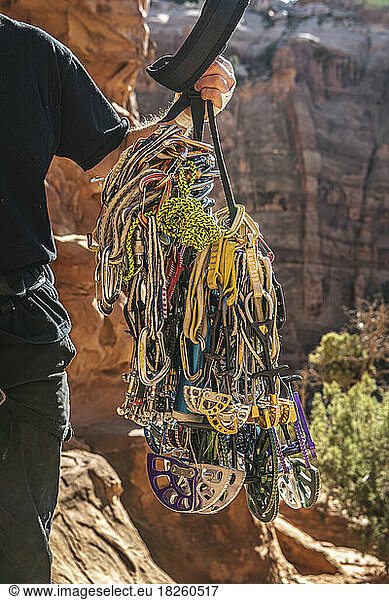 Cropped image of man carrying climbing equipment at Bride Canyon
