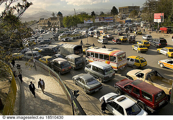 Crowded traffic circles during rush hour are a new feature in Kabul since the fall of the Taliban.